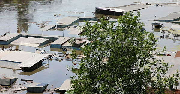 Photograph of a flooded settlement after the destruction of the Kakhovka Dam